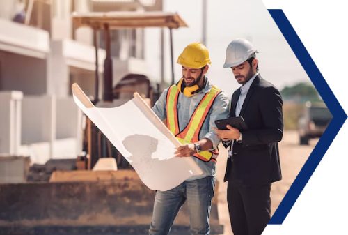 Construction workers reviewing plans